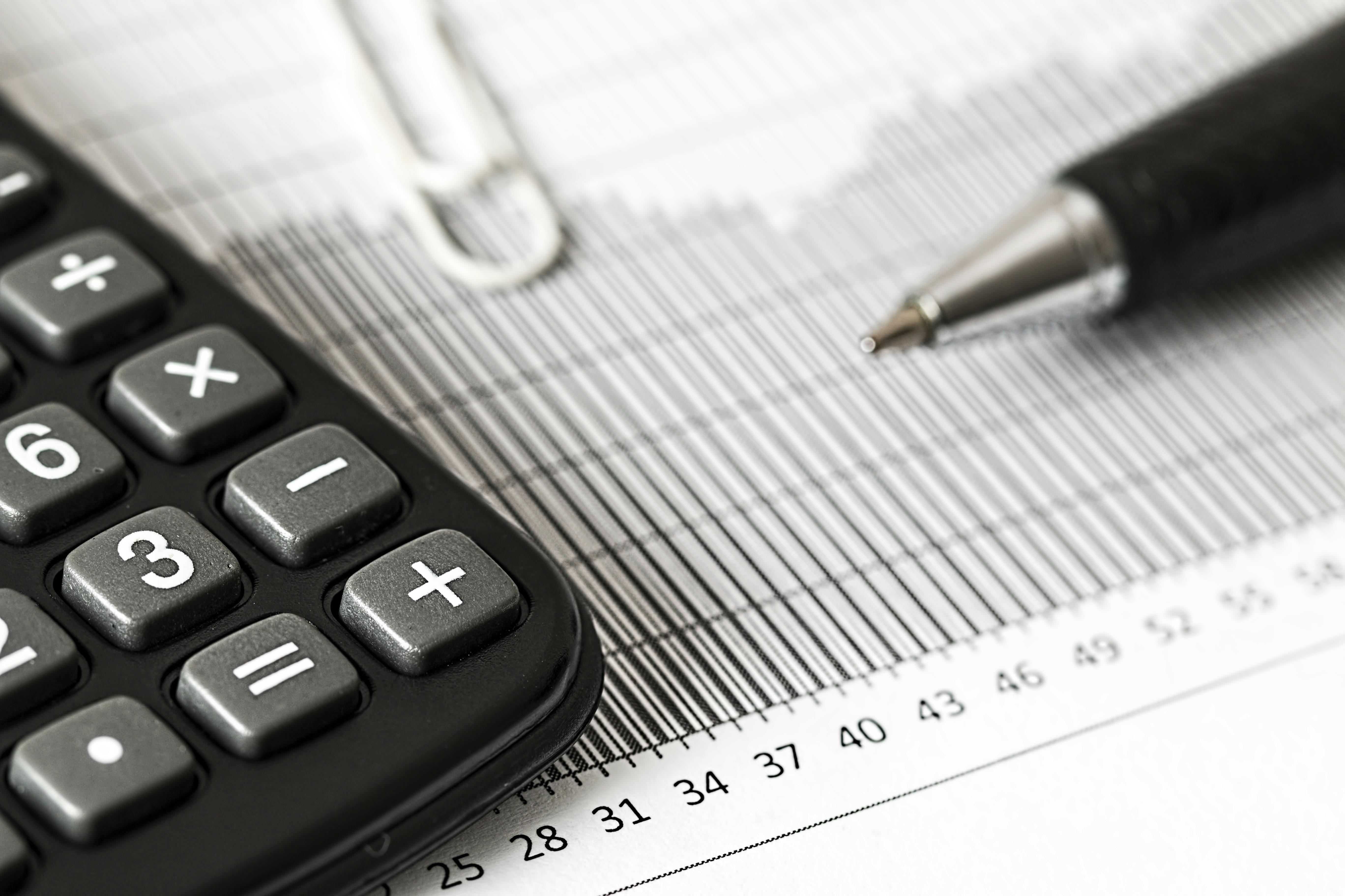 Calculator%20and%20Pen%20on%20Table
